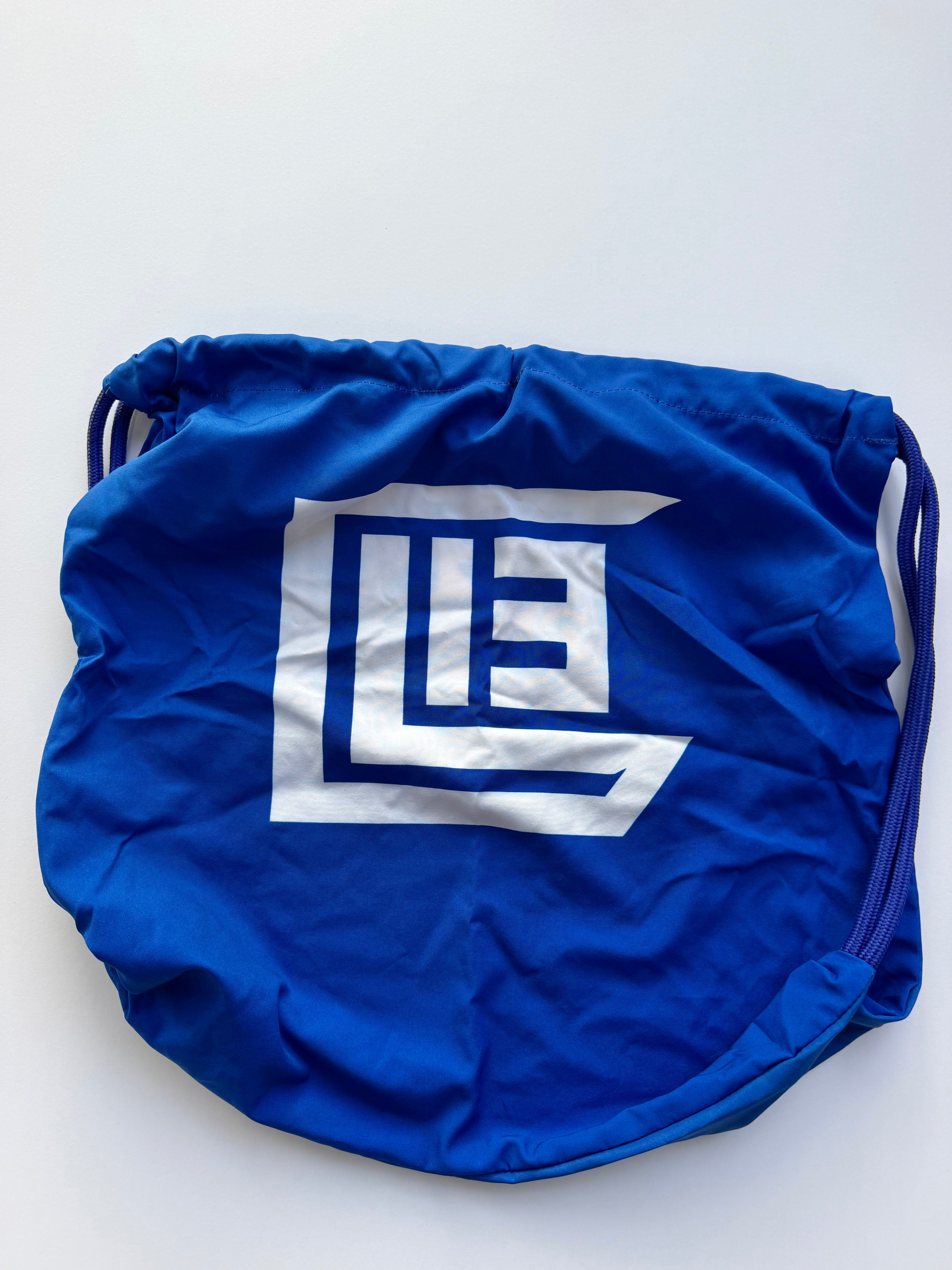 LIE LOCK IN DRAWSTRING BAG
