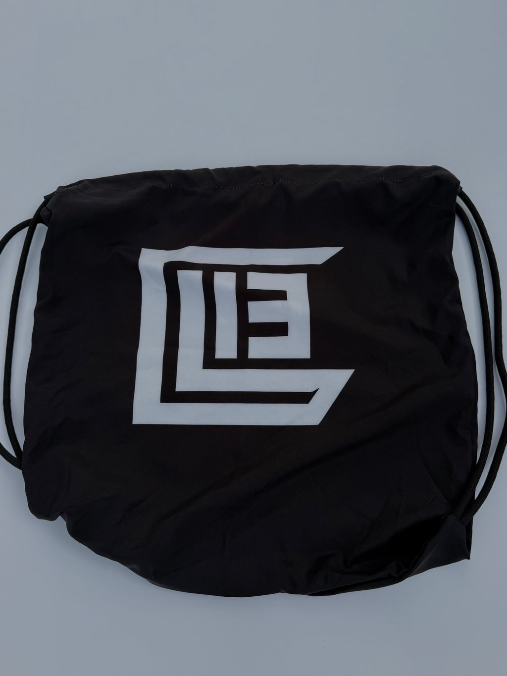 LIE LOCK IN DRAWSTRING BAG