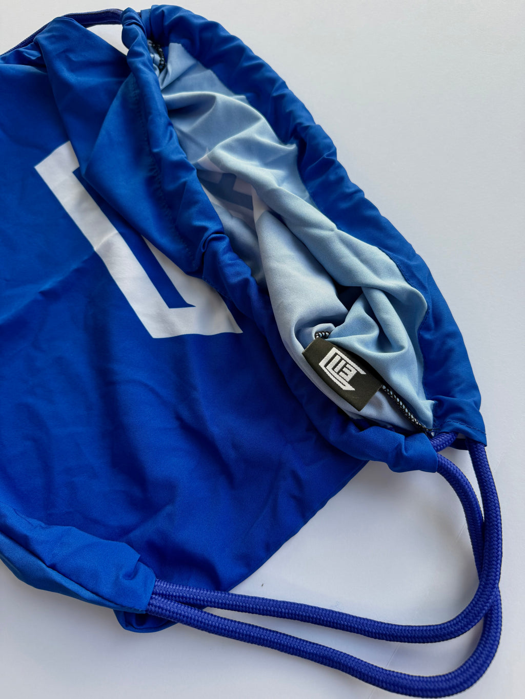 LIE LOCK IN DRAWSTRING BAG